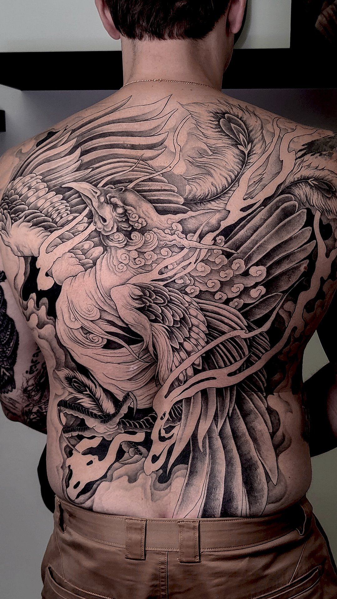 nugaros tatuiruotė tattoo kaune scion ink studija Kaunas